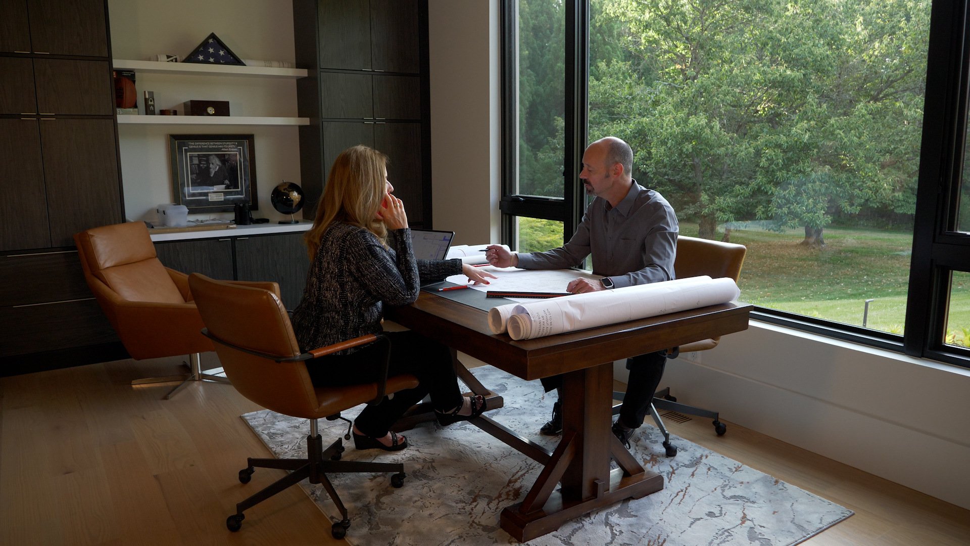 AV Architects and Builders owners Tony and Francisca Alonso Have a Meeting at their Custom Home in Great Falls